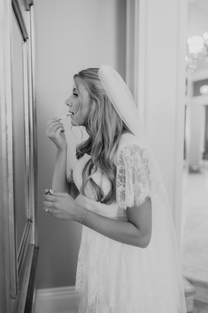 Bride and Groom sharing a bite of their wedding cake at the Old Rock Church wedding venue, taken by Robin Kunzler Photo.
