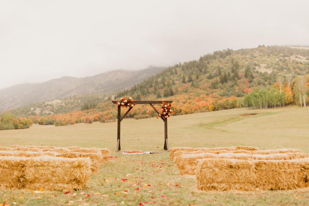 Wedding ceremony setup at a ranch in Utah with spectacular mountain view